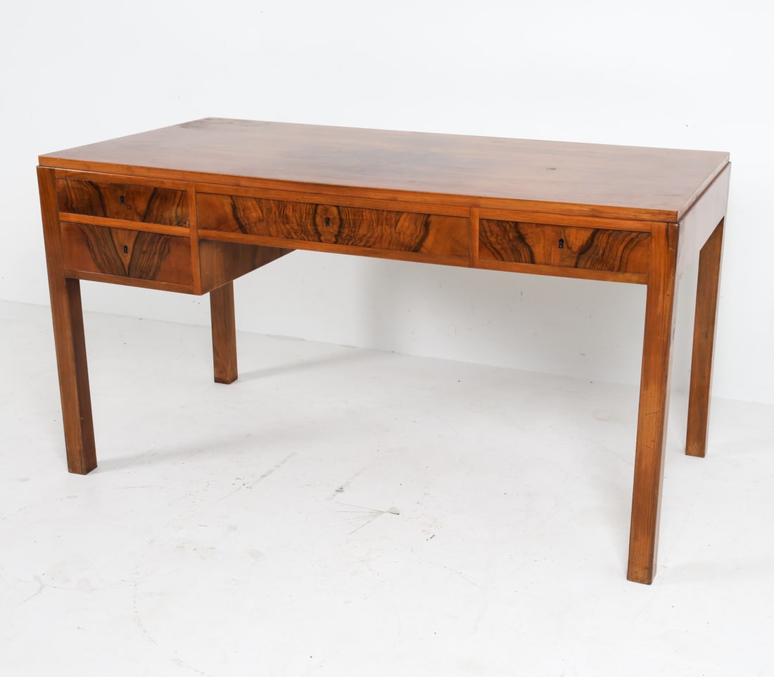 ERIK WORTS MID-CENTURY DANISH ROSEWOOD DESK: Dimensions: H 30" x W 55.5" x D 28" Condition: Slight rubbing and surface marks. No key. Wear consistent with age and use.