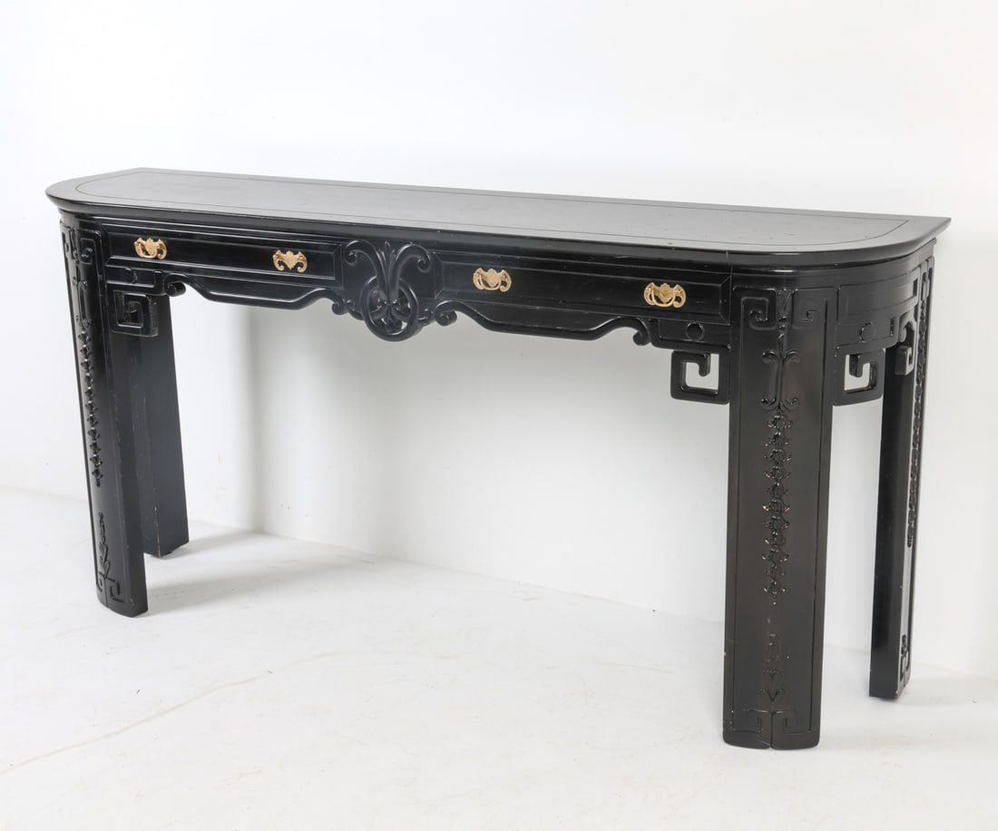 VINTAGE HOLLYWOOD REGENCY STYLE CONSOLE TABLE: Black lacquer. Carved detailing to apron. Dimensions: H 37" x W 74.5" x D 19" Condition: Previous repair to proper right corner. Piece included that is currently missing from front apron, Scattered sc
