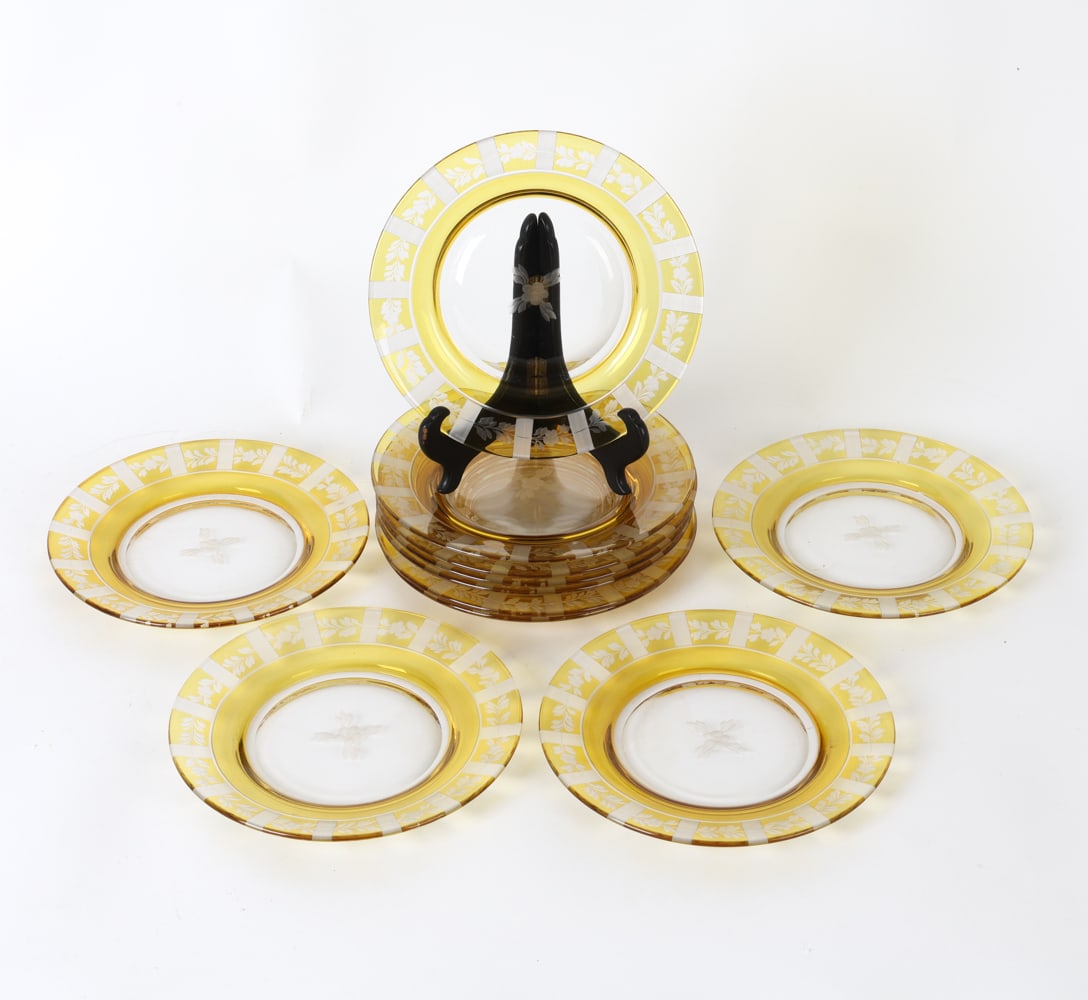 ANTIQUE BOHEMIAN GLASS PLATES: Total of 11. Yellow bohemian glass with floral etchings. Dimensions: Dia 8" Condition: Minor scuffs and marks. Presents well overall.