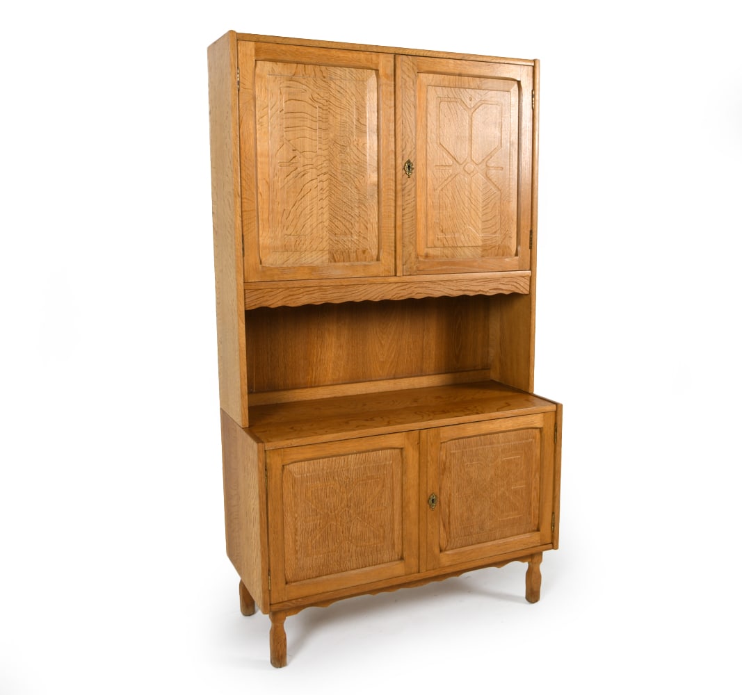 MID-CENTURY DANISH OAK CABINET C. 1970S: Key included. Adjustable shelves. Top sits on base with dowels. Dimensions: As Displayed H 71" x W 39.75" x D 18". Base H 28". Condition: Few scuffs and dings to top, edges. Previous wear to molding o