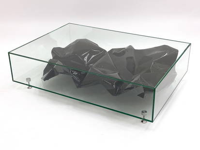 FREDRIKSON STALLARD "BLACK CRUSH" COFFEE TABLE: Aquired from David GIll Gallery, Coffee table incased in glass with a painted and polished aluminum and steel abstract sculpture on the inside. With steel legs at bottom. With invoice. Provenance: Fro