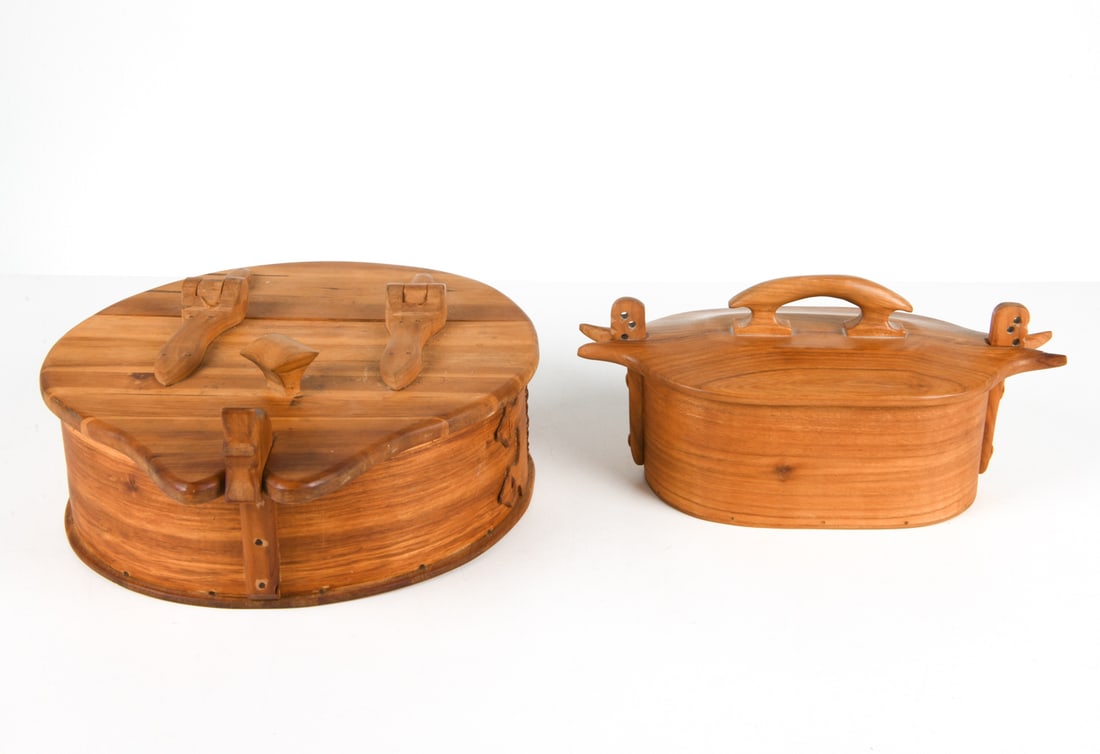 (2) SWEDISH TEAK BENTWOOD BOXES: Both signed to undersides. Both made with pressure latches to lids. Larger one with hinged lid. Dimensions: (Largest) H 6.5" x Dia 13.5" x D 15" Condition: Minor scuffs and marks to wood. Presents wel