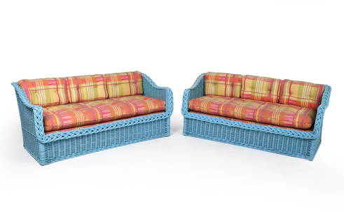 PAIR OF CONTEMPORARY WICKER OUTDOOR SOFAS: Blue-tone wicker sofas, Two 3 seaters with upholstered cushions. Dimensions: (Largest) H 64.5 x W 68" x D 31", SH 17" Condition: Moderate rubbing and loss to blue paint. Wear consistent with age and u