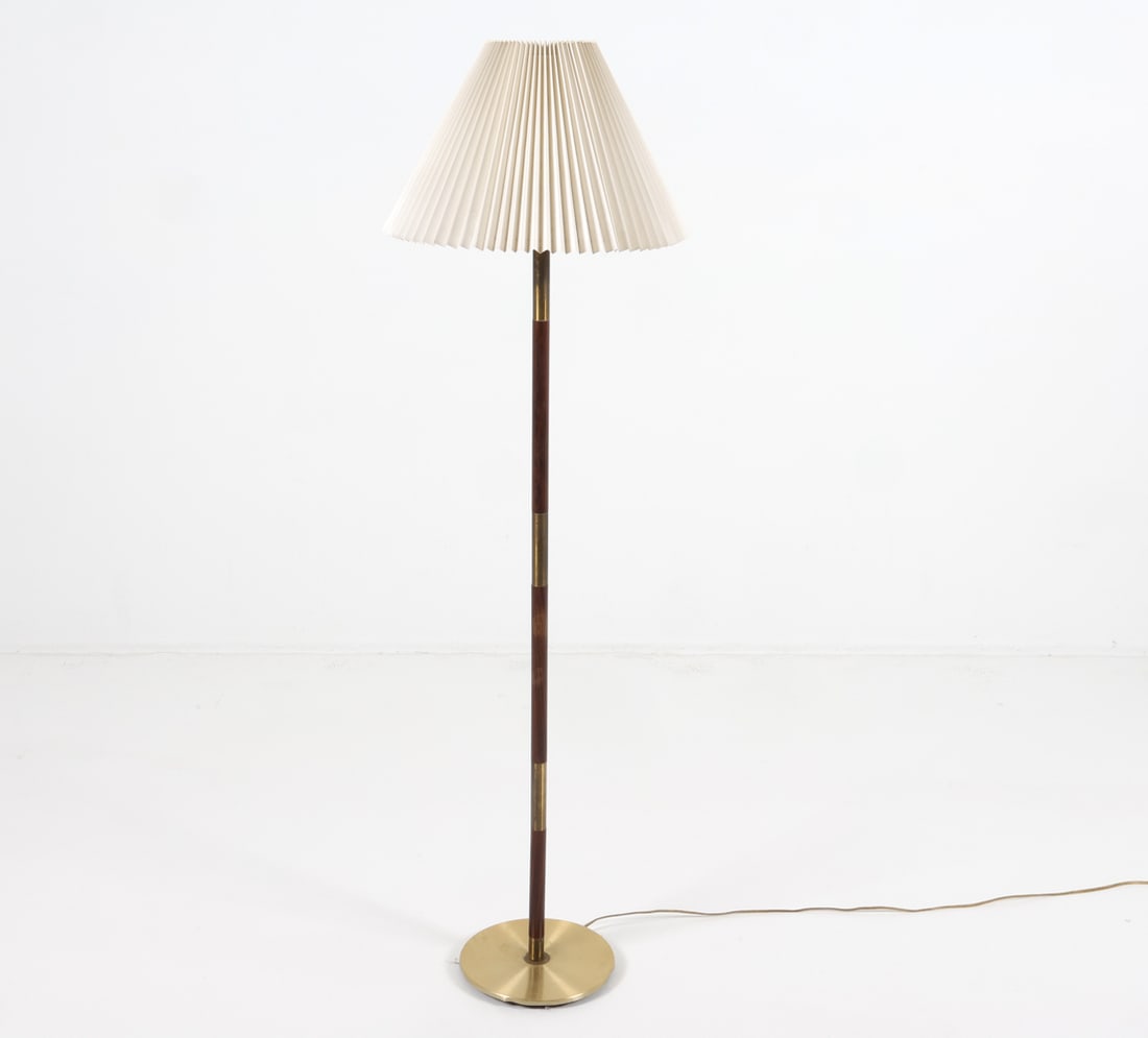 DANISH TEAK & BRASS FLOOR LAMP C. 1960S: Dimensions: H 58" x Dia. Shade 17". Dia. Base 10.25". Condition: Wiring untested, cord cut. Few scuffs, scratches, and dings to metal and wood. Wear consistent with age and use. GCE 173