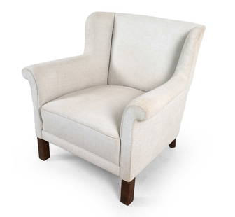 MID-CENTURY DANISH WOOL LOUNGE CHAIR C. 1960S: White-tone wool upholstery. Dimensions: H 31" x W 31.5" x D 27", SH 16" Condition: Scattered blemishes to upholstery. Nicks and dings to wood legs. Presents well overall. GCE 175