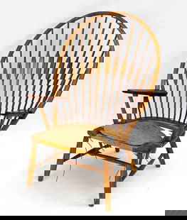 HANS WEGNER JOHANNES HANSEN PEACOCK CHAIR: Originally designed for Johannes Hansen in 1947. Ash and teak. Signed underneath. Dimensions: H " x W " x D " Condition: Cord seat needs to be replaced.