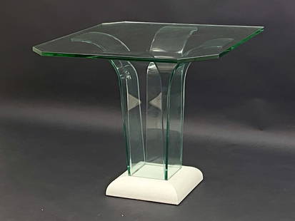 MODERNIST ART DECO GLASS WATERFALL TABLE: Side table/small dining table. Glass top and sides with a pedestal wooden base. Dimensions: H 30" x W 34.25" x D 35.75" Condition: Chips to some corners and edges of base glass including losses to por