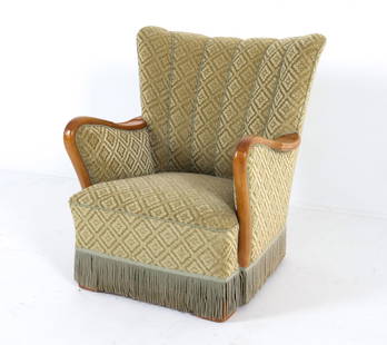 1940'S DANISH HIGHBACK MOHAIR LOUNGE CHAIR: Circa 1960s. Channel-back with green-tone patterned mohair with fringe skirt and oak armrests; Dimensions; H 35" x W 29" x D 27" , SH 14" Condition: Scuffs and nicks to wood armrests. Present well ove