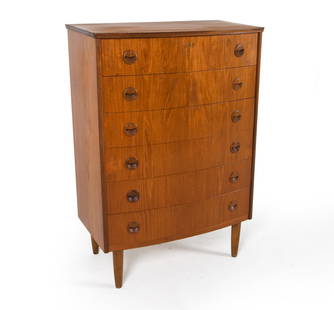 DANISH BOW-FRONT TEAK CHEST OF DRAWERS C. 1960S: Key included. Dimensions: H 44.5" x W 30" x D 16". Condition: Minor scuffs and rubs. Wear consistent with age and use. PER F061