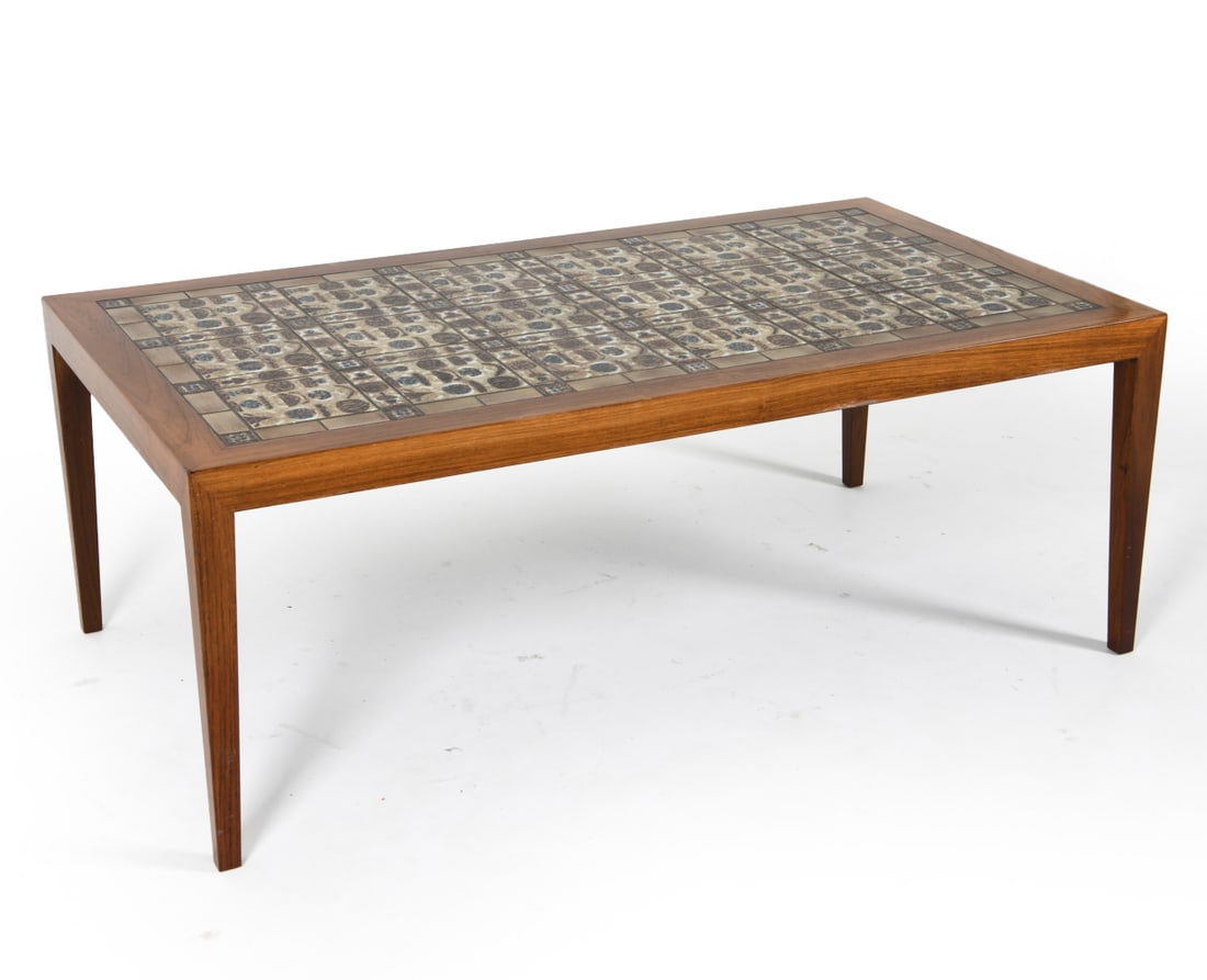 SEVERIN HANSEN ROSEWOOD TILE COFFEE TABLE: For Haslev. Tagged underneath. Rosewood table in lacquered finish with ceramic tile top. Dimensions: H 20" x W 52" x D 29.5". Condition: Minor surface scratches. Wear consistent with age and use. PER