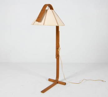 JAN WICKELGREN ANETA DANISH BEECH FLOOR LAMP: Beech stand with fabric wrapped shade. Denmark, circa 1970s. Dimensions: H 50" x W 18" x D 17.5". Condition: Wiring untested, European plug. Minor scuffs to wood. Wear consistent with age and use. PER