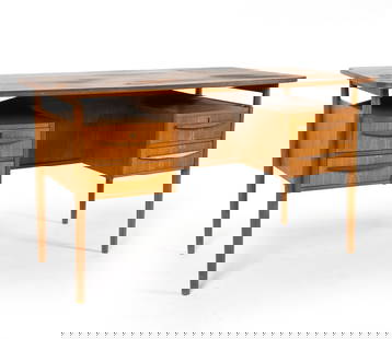 GUNNAR NIELSEN DANISH TEAK WRITING DESK C. 1960S: For Tibergaard. Key included. Dimensions: H 29" x W 51" x D 26.5". Condition: Minor scuffs and scratches to top, some sun fading and spots of discoloration. Wear consistent with age and use. PER F030