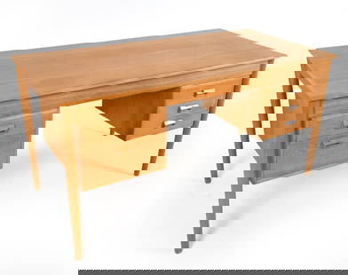 DANISH OAK WRITING DESK C. 1970S: Dimensions: H 29" x W 57.25" x D 28.5". Condition: Some chipping/peeling to veneer within underside. Wear consistent with age and use. PER E099