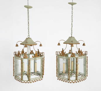PAIR OF CHINOISERIE TOLE HALL LANTERNS: Tole ware in gilt and gold-tone paint. Glass door panels. Hanging bells to top. Dimensions: H 45" x W 15.25' x D 16"\ Condition: Surface soiling. Slight nicks and scuffs to paint. Untested. Wear consi