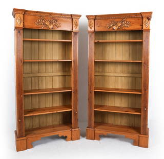 PAIR OF VINTAGE FRENCH COUNTRY PINE BOOKCASES: Dimensions: H 86.5" x W 42.25" x D 17" Condition: Intentionally distressed. Slight dings to edges. Some loss to one's cornice trim. Wear consistent with age and use.