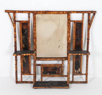 19TH C. ENGLISH AESTHETIC BAMBOO MIRROR WALL SHELF: With lacquered panels, shelves and center mirror with beveled glass. Dimensions: H 33.5" x W 39" x D 6" Condition: Nicks, marks and dings to lacquered finish. Wear consistent with age and use.