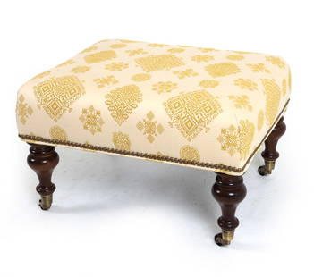 LEE INDUSTRIES EMBROIDERED OTTOMAN: Label to underside. Embroidery to upholstery, Brass casters . Dimensions: H15" x W 23" x D 20" Condition: Faint marks to legs. Presents well overall