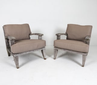 PAIR OF OUTDOOR TEAK LOUNGE CHAIRS