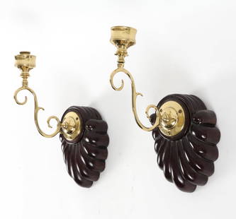 PAIR OF 20TH C. MAHOGANY & BRASS CANDLE SCONCES: Carved shell-form backplates. No glass shades Dimensions: H 14" x W 6" x D 9.5" Condition: Faint scuffs and nicks to wood. Presents well overall.