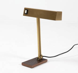GERMAN PFAFFLE LEUCHTEN BRASS TABLE LAMP C. 1960S: Dimensions: H 13.5" x W 9" x D 7". Condition: Wiring untested, European plug. Few scuffs to metal and chips to wooden base. Wear consistent with age and use. PN118