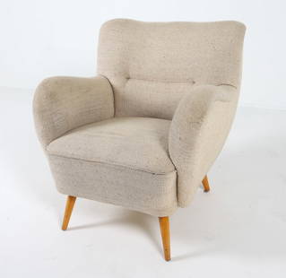 GERMAN WOOL LOUNGE CHAIR C. 1950S: Lounge chair in white wool fabric with tapered beech legs. Germany, circa 1950s. Dimensions: H 32" x W 30" x D 28" x SH 17". Condition: Minor suffs and dings to legs. Wear consistent with age and use.