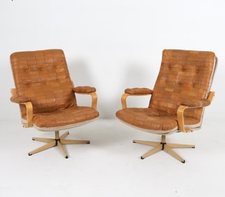 PAIR OF SWEDISH & BEECH LEATHER LOUNGE CHAIRS
