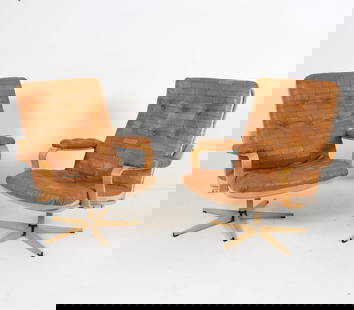 PAIR OF SWEDISH & BEECH LEATHER LOUNGE CHAIRS: Congac-tone patchwork leather upholstery. Metal swivel base. Dimensions: H 34" x W 29.5"x D 27", Sh 17" Condition: Slight blemishes and creases to leather upholstery. Wear consistent with age and use.