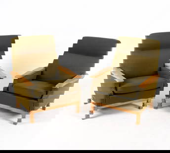 PAIR KJAERNULF STYLE DANISH OAK LOUNGE CHAIRS: Circa 1970s. Carved legs with green-tone wool upholstery and cushions. Brass tack edges. Dimensions: H 36.5" x W 30.75" x D 29", SH 16" Condition: Light sun fading to upholstery. Blemish to upholstery