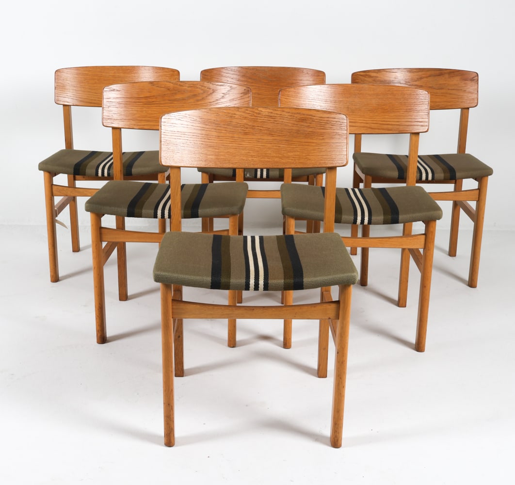 (6) MOGENSEN STYLE DANISH OAK DINING CHAIRS 1960S: Indistinct stamp to undersides. Green-tone wool upholstered seats. Dimensions: H 30" x W 19.5" x D 18" , SH 18". Condition: Light scuffs, scratches and surface marks. Presents well overall. DMQ108