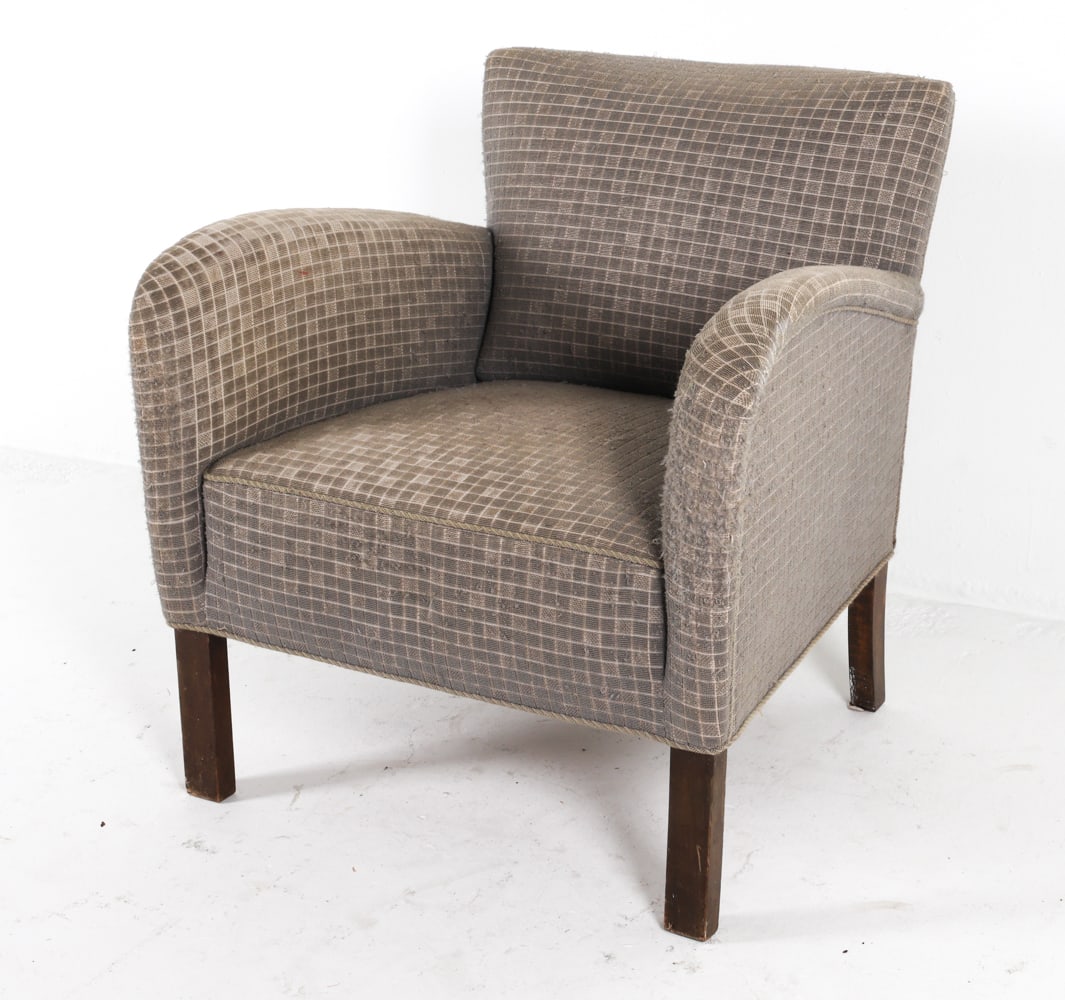 MID-CENTURY DANISH LOUNGE CHAIR C. 1960S: Gray-tone wool upholstery. Dimensions: H 29.5" x W 27.5" x D 26", SH 15" Condition: Moderate thinning and fraying to wool upholstery on armrest, back and cushion. Wear consistent with age and use. DMQ
