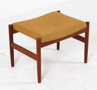 MANNER OF KAI KRISTIANSEN DANISH TEAK OTTOMAN: Yellow-tone wool upholstery. Dimensions: H 15" x W 21" x D 21.25" Condition: Water blemishes to wool. Minor scuffs to teak frame. Wear consistent with age and use.
