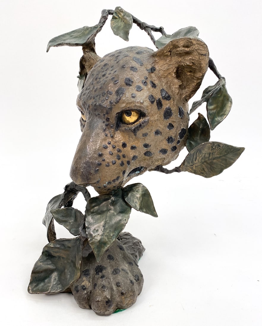 MARK HOPKINS (20/21ST C.) BRONZE LEOPARD SCULPTURE: Leopard hiding in the brush. Sculpture called "Night Hunter", by Mark Hopkins. Signed, dated 94, and numbered 86/750. Dimensions: H 15" x W 11" x D 8" Condition: Wear consistent with age. Presents nor