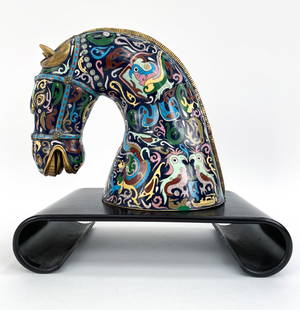CHINESE CLOISONNE ENAMEL HORSE HEAD SCULPTURE: Brass and enamel horse head sculpture with multi-colored designs and patterns including dragons, chickens, and other animals. On a wooden wave form footed stand. Unmarked. Dimensions: H 14.5" x W 14.5