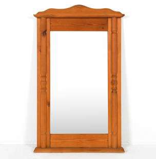 SWEDISH PINE WALL MIRROR C. 1960S: Dimensions: H 39.75" x W 24.25" x D 2.75" Condition: Moderate dings and nicks to edges. Glue residue to backside. Wear consistent with age and use.