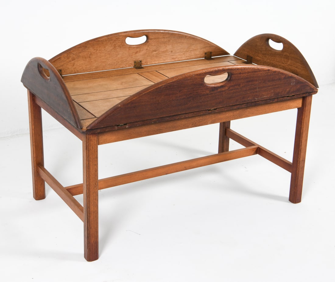 DANISH MAHOGANY BUTLERS TRAY COFFEE TABLE: Top sits freely on base. Dimensions: H 20.5" x W 50" x D 32". Condition: Minor scuffs and dings. Wear consistent with age and use. BN 038