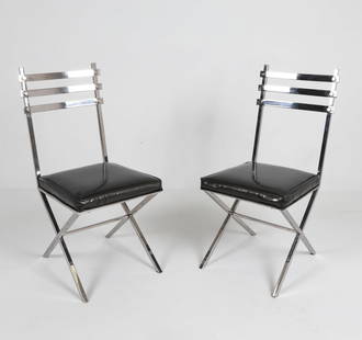 PAIR OF MILO BAUGHMAN STYLE SIDE CHAIRS: Chrome steel frames with vinyl covered seats. Dimensions: H 37" x W 16" x D 18" x SH 18". Condition: Few small tears to seat. Minor scuffs to metal. Wear consistent with age and use.
