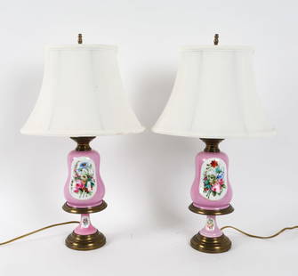 PAIR OLD PARIS FRENCH PORCELAIN LAMPS: Hand painted floral designs to centers with brass accents. Dimensions: W/shades H 22.25" x W 13" x D 8.5" Condition: Light patina to brass bands. Untested. Wear consistent with age and use.