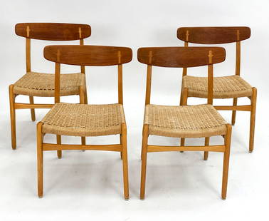 (4) DANISH HANS WEGNER TEAK & WOVEN CORD CHAIRS: Set of (4) solid beech wood chairs with teak backrest and exposed joints. Hans Wegner for Carl Hansen & Son, model CH 23. Circa 1960s.Dimensions: H 31.5" x W 19.5" x D 18" x SH 17.5"Condition: Minor s