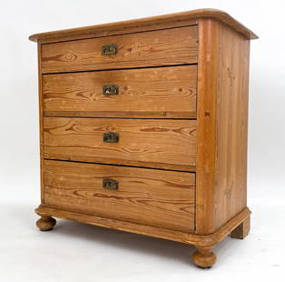 ANTIQUE DANISH PINE CHEST OF DRAWERS: Features four drawers with brass hardware and carved edges to top and base. Unmarked. Dimensions: H 35.5" x W 37" x D 19.75" Condition: Light soiling to top and inside the drawers, scuffs, nicks and d
