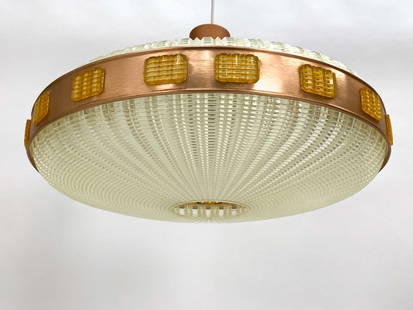 MID-CENTURY SPACE AGE SAUCER PENDANT LIGHT 1970S: Plastic textured shade with copper metal accents. Dimensions: H 11" x Dia. 17". Condition: Few scuffs and scratches to metal. Wiring untested. Wear consistent with age and use.
