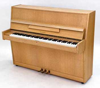 HINDSBERG SCANDINAVIAN OAK UPRIGHT PIANO: Mid-Century upright piano. Marked Hindsberg and Finland. Dimensions: H 42.5" x W 57" x D 24". Condition: Wear consistent with age and use. Faint tobacco odor. No key.