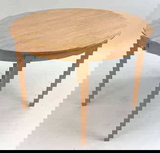 SCANDINAVIAN OAK EXTENDING DINING TABLE: 20TH C. (2) Leaves included. Dimensions: H 29" x Dia. 42". Leaves W 15". Condition: Minor surface scratches. Wear consistent with age and use.