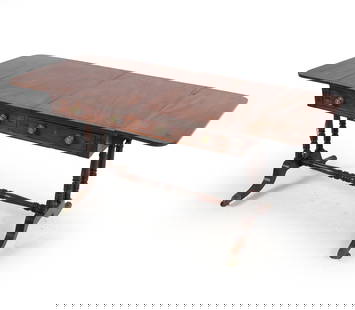ANTIQUE DROP-LEAF MAHOGANY TABLE: (2) Drop leaves. Carved decoration to legs. Brass capped feet with castors. Dimensions: H 29.25" x W 24" x D 36". Condition: Water rings to top. Previous older repair to one leaf. Other scuffs and scr