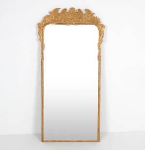 18TH C. GEORGE II GILT CARVED LARGE MIRROR: Gilt and carved frame with gesso and two separated beveled glass panels. Dimensions: H 65.5" x W 32". Condition: Few previous repair to carved crest. Other scuffs and scratches to frame. Wear consiste