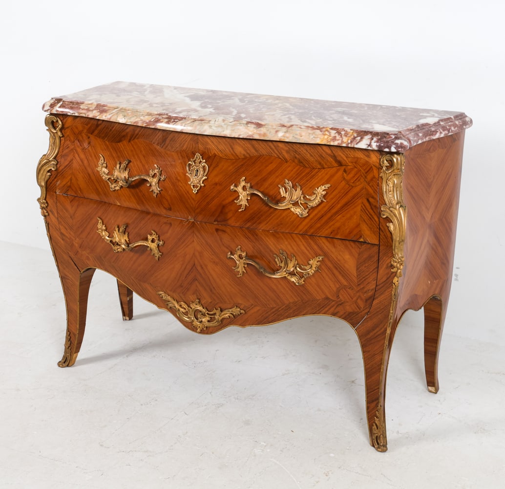 FRENCH LOUIS XV STYLE MARBLE TOP CHEST: Chest with parquetry pattern with brass accents to sides and brass drawer pulls. Marble top. Mid 20th century. Dimensions: H 34.5" x W 48" x D 20". Condition: Brass loose in places, few chips to venee