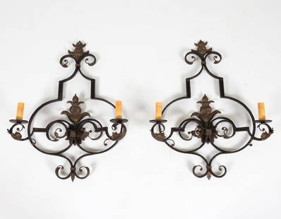 PAIR ORNATE WROUGHT IRON SCONCES: Dimensions: H 33" x W 25" x D 7" Condition: Slight discoloration to faux candles. Untested. Wear consistent with age and use.