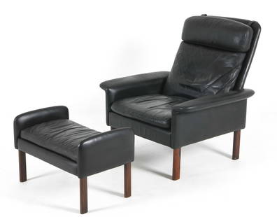 HANS OLSEN STYLE LEATHER LOUNGE CHAIR & OTTOMAN: Circa 1960s. Black-tone leather upholstery and cushions, with rosewood legs. Chair with flared armrests. Dimensions: H 37.25" x W 36" x D 29", SH 16" Ottoman: H 17.5" x W 27" x D 16", SH 14" Condition