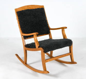 MID-CENTURY DANISH BEECH & LAMBSWOOL ROCKING CHAIR: Circa 1960s. Gray-tone lambs wool upholstery. Dimensions: H 35" x W 23" x D 35.5", SH 18" Condition: Moderate nicks, scuffs and rubbing to finis throughout frame. Slight flattening to wool seat uphols