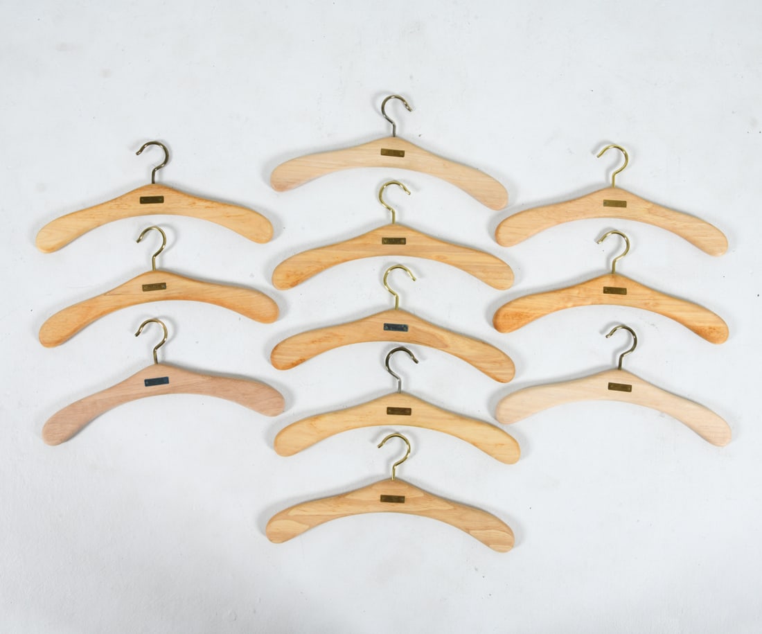 TRIP TRAP DANISH COAT HANGER GROUPING: Marked Trip Trap to hangers. Dimensions; H 8" x W 18" Condition: Light discoloration and scuffs to wood. Tarnishing to plaques. Presents well overall.