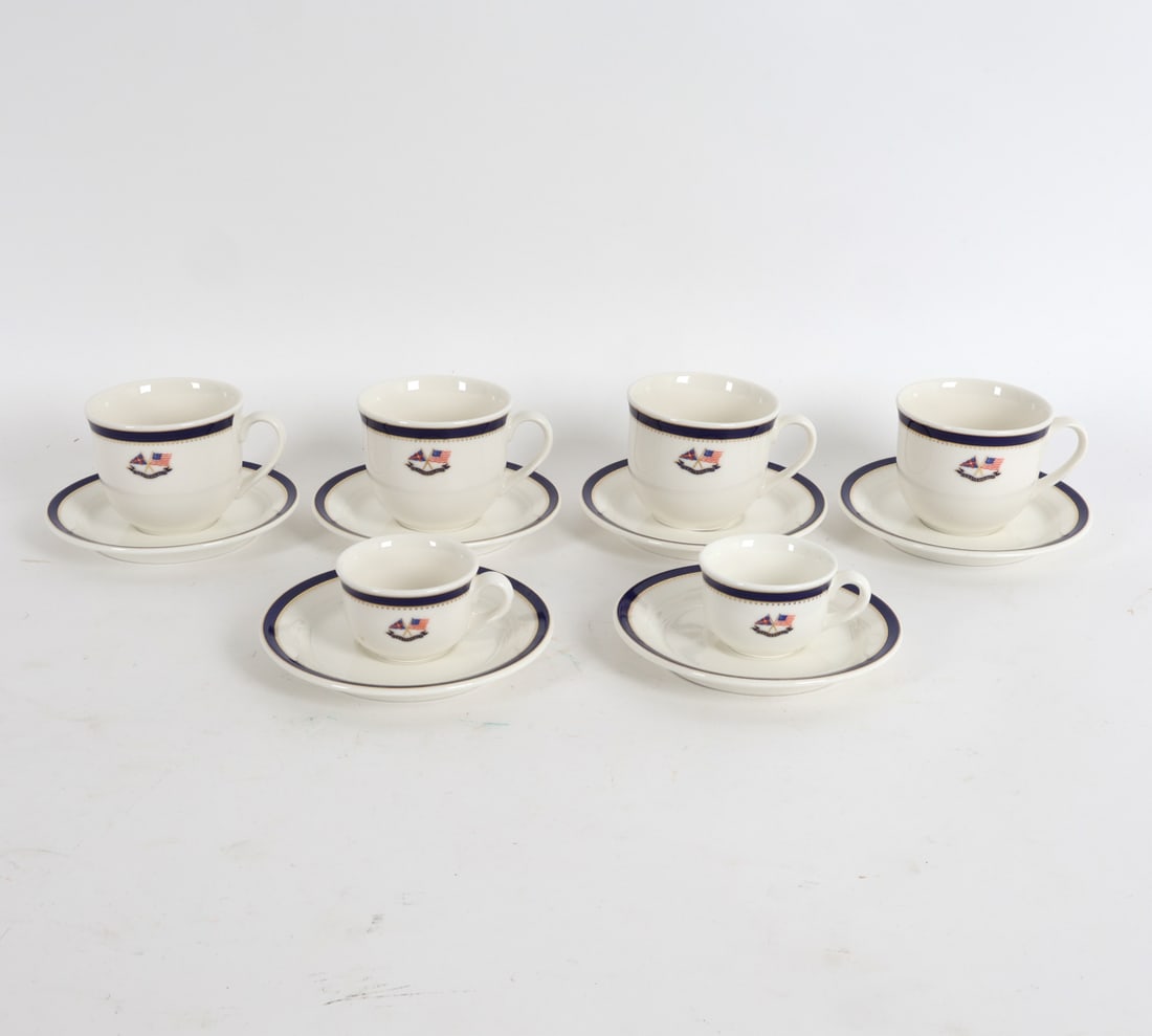 NEW YORK YACHT CLUB CENTENNIAL VILLEROY & BOCH: Includes (6) saucers and (6) tea cups. The Centennial design with blue and gold decoration with flags to commemorate 100 years in 1944. Contemporary Dimensions: Saucers Dia. 6.25". Largest Cups H 3".